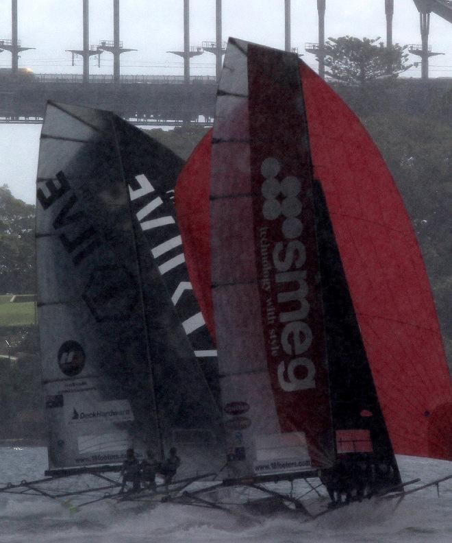 Smeg and Ilve tight spinnaker action in rain squall - JJ Giltinan 18ft Skiff Championship © Frank Quealey /Australian 18 Footers League http://www.18footers.com.au
